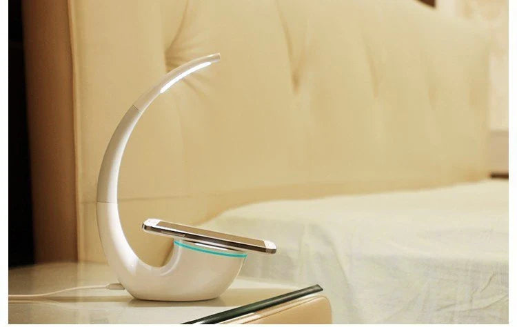 Stylish wireless charging table lamp with minimalist design, touch controls, and energy-efficient LED lighting
