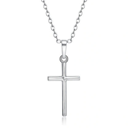 Elegant cross pendant necklace in gold and silver tones, a timeless British accessory