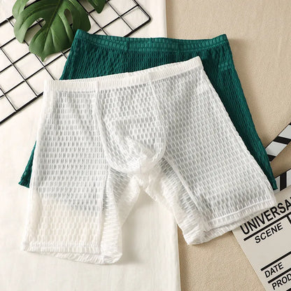 Men's solid-colour lace boxer shorts with a hip-lifting shaping design.