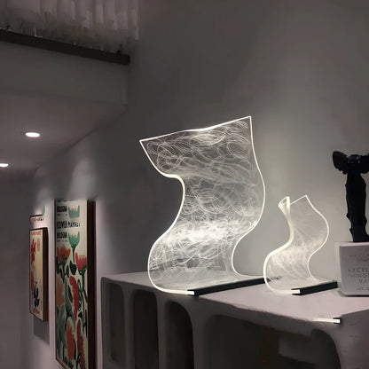 USB-powered bedside lamp with three colour settings and compact design