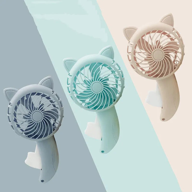 Large plastic cartoon hand-press fan toy for children measuring 11 by 20 centimetres