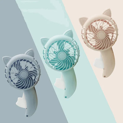 Large plastic cartoon hand-press fan toy for children measuring 11 by 20 centimetres