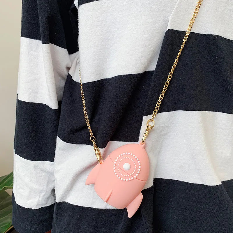Pink silicone protective cover on an AirPods charging case.