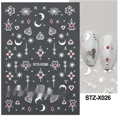 Assortment of black and silver nail sticker designs including cartoon and French tip patterns on a plastic sheet.