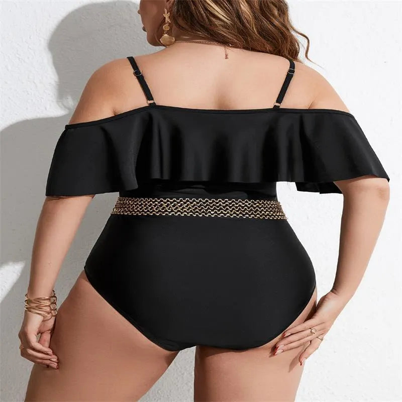Black solid colour one-piece swimsuit for women on a mannequin.