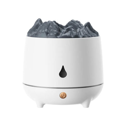 Volcano-shaped white ultrasonic humidifier with mist output on wooden surface