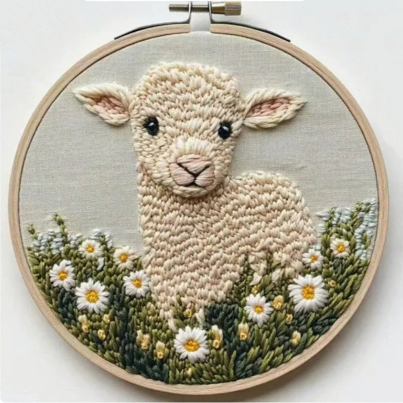 Beginner embroidery craft suit showing six cartoon designs including turtle, sheep, horse, fox, butterfly, and mermaid patterns