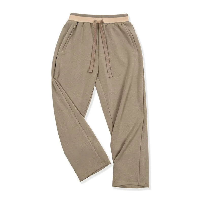 Men's loose straight polyester sweatpants in dark blue, grey or light brown with medium elastic waist and anti-wrinkle finish