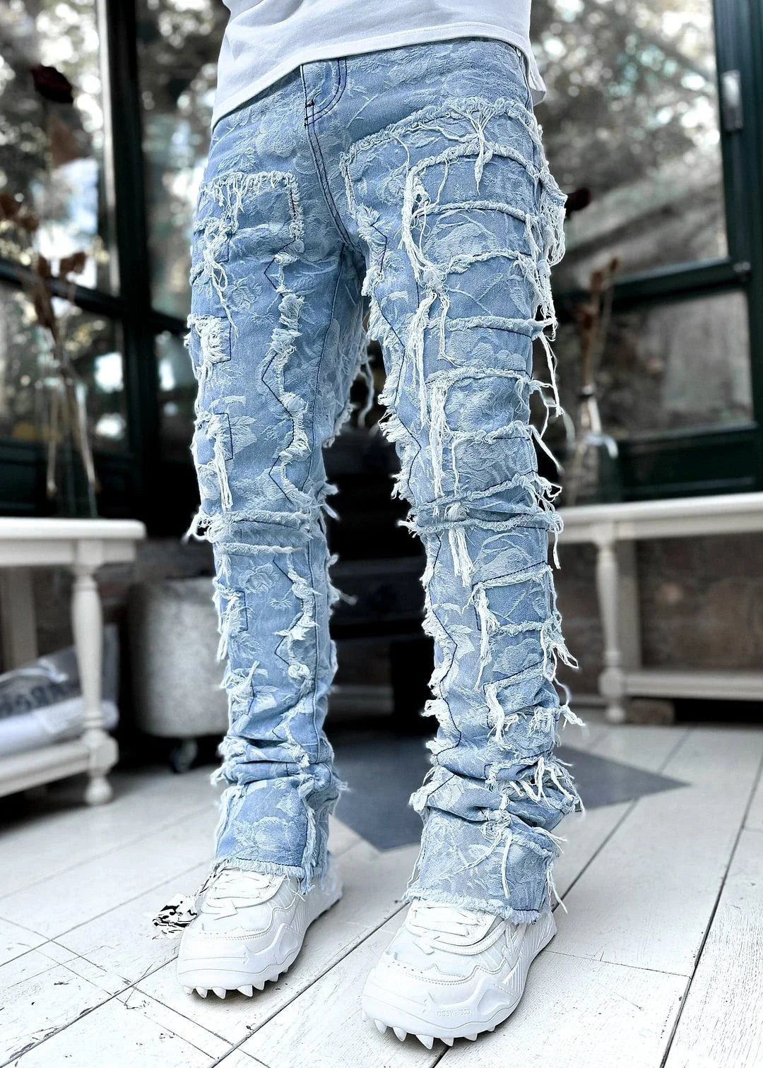 Men's slim-fit cotton jeans with unique patched design in various classic colors