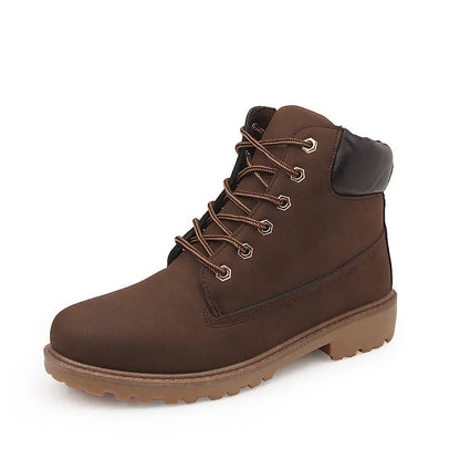 Martin boots with lace-up front, round toe and flat low heel in pink with velvet lining