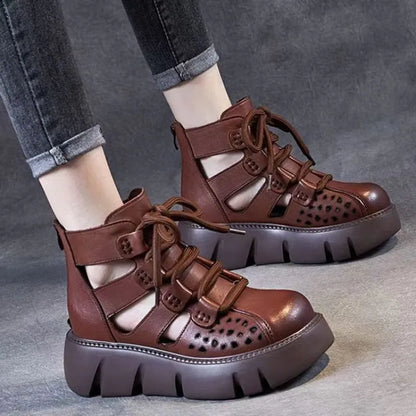 Women's platform sandals with hollow hole design in soft cowhide leather, shown in black colour with sporty styling