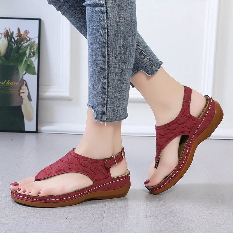 Comfortable women's wedge sandals in various colors with adjustable straps and a lightweight sole