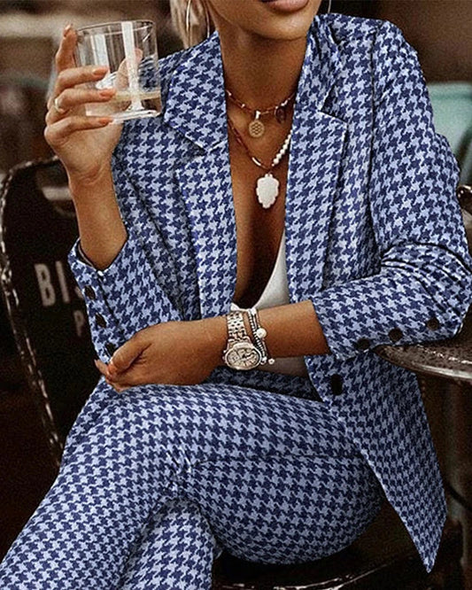Stylish plaid blazer and pant set for modern women, featuring a slim-fit, tailored design and breathable cotton blend fabric