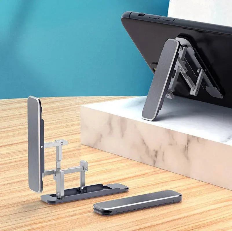 Aluminium folding mobile phone holder with backstick adhesive shown in black colour at 4mm thickness