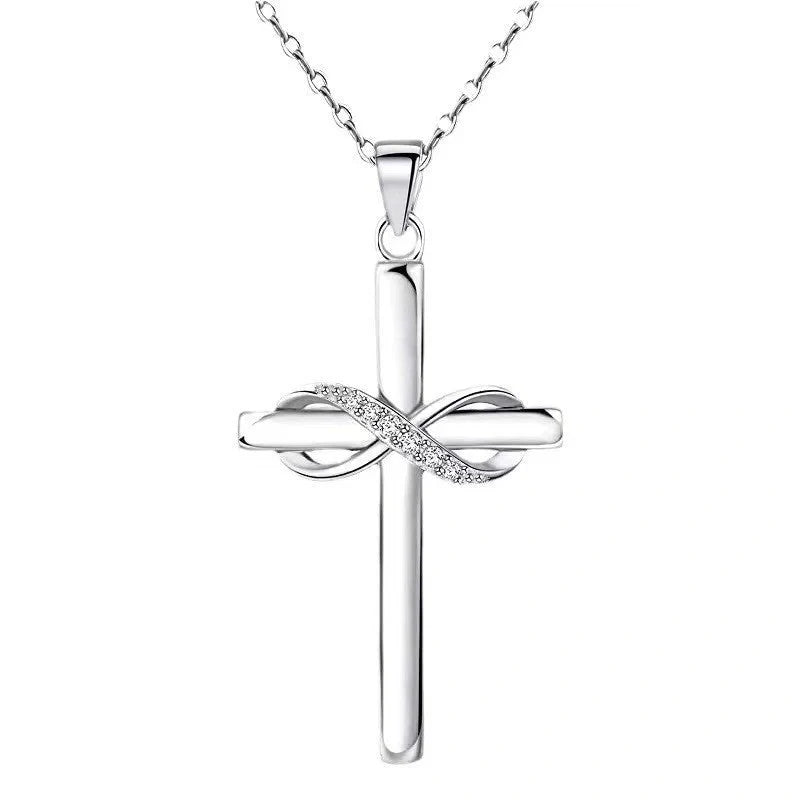 Elegant gold cross and infinity pendant necklace for women, showcasing timeless beauty and spiritual meaning.