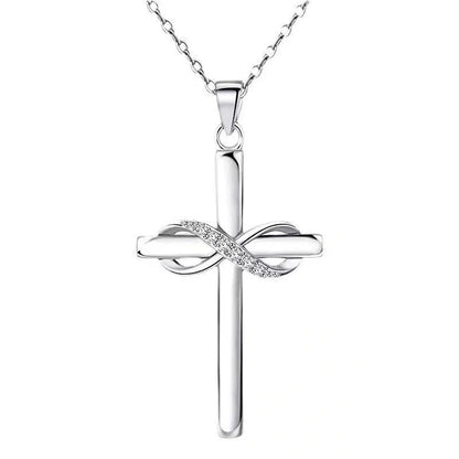 Elegant gold cross and infinity pendant necklace for women, showcasing timeless beauty and spiritual meaning.