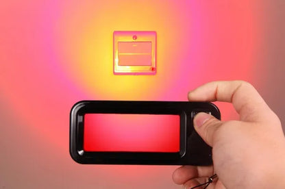 Handheld red laser reverse camera detector for scanning hidden lenses up to 8 metres away.