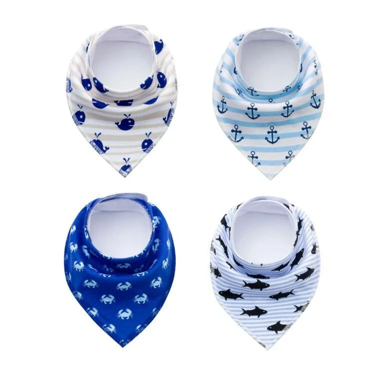 Set of four cotton baby bibs with arrow and wave designs for mess-free feeding