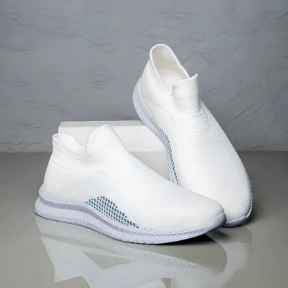 Low-top casual sneaker in Popcorn Flyknit fabric, showing flat heel and round toe design.