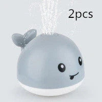 Electric induction whale spray toy for baby bath time with automatic water spray and flashing lights