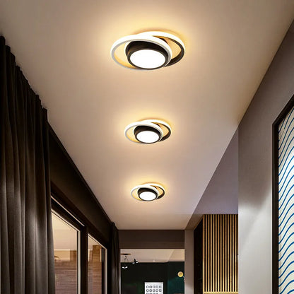 Modern geometric aluminium ceiling light in round and square styles with LED illumination.