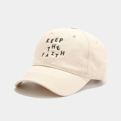Men's cotton baseball cap with small embroidered letters on front in adjustable dome design