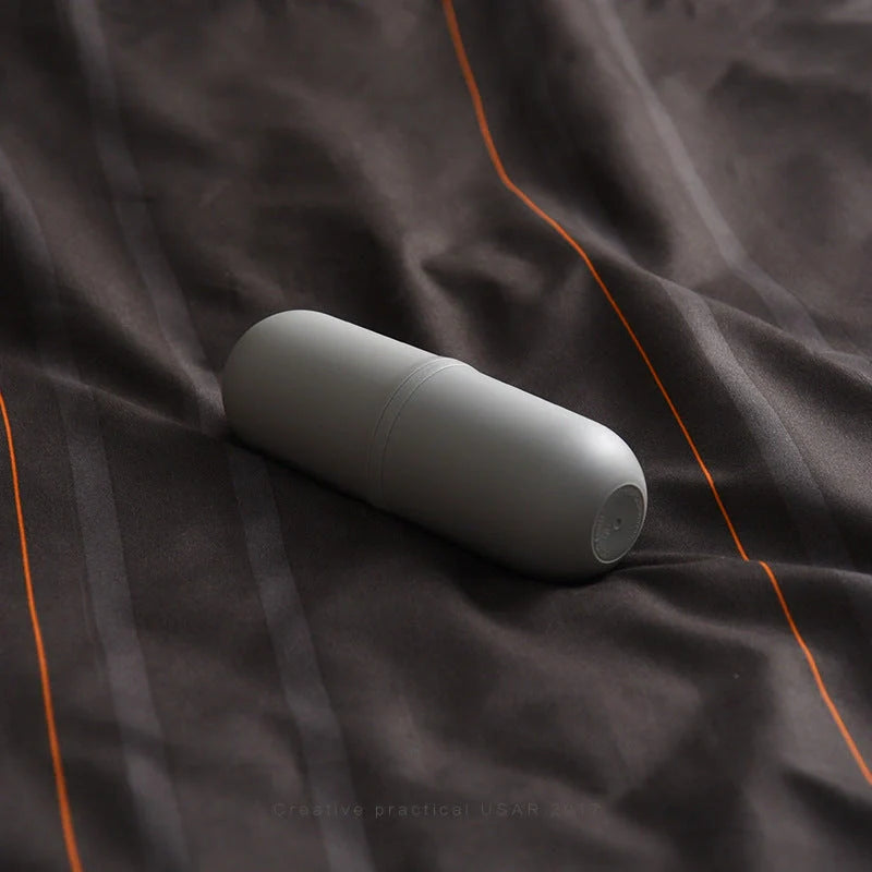 Capsule-shaped multi-function travel bottle in various colours with leak-proof design