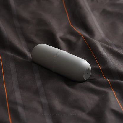 Capsule-shaped multi-function travel bottle in various colours with leak-proof design