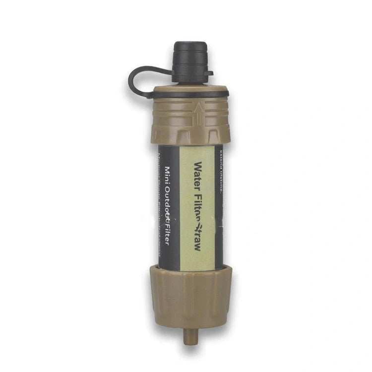 Compact portable water purifier straw with filter for outdoor adventures and emergencies.