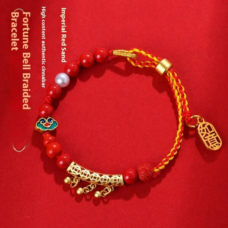 Women's hand-woven cinnabar bracelet with bell design in emperor red sand colour on red rope cord
