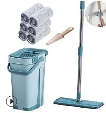Blue flat floor mop with rotating head and microfiber pad beside plastic bucket for floor cleaning