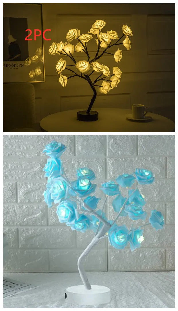 White and red rose flower LED lamp on a table with bonsai tree shape and warm white glow.