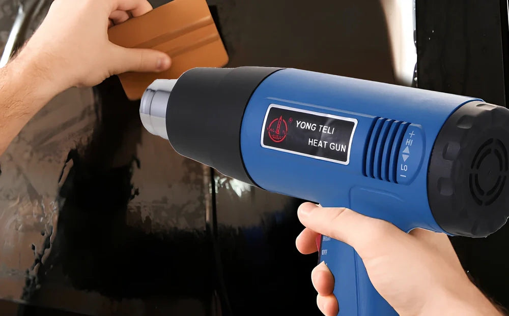 Industrial heat gun with temperature dial showing 300-500°C range and dual air flow settings