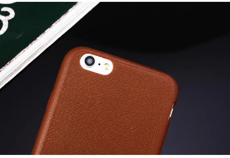 Leather-textured TPU phone case for iPhone in black, brown, navy blue, or wine red colour options.