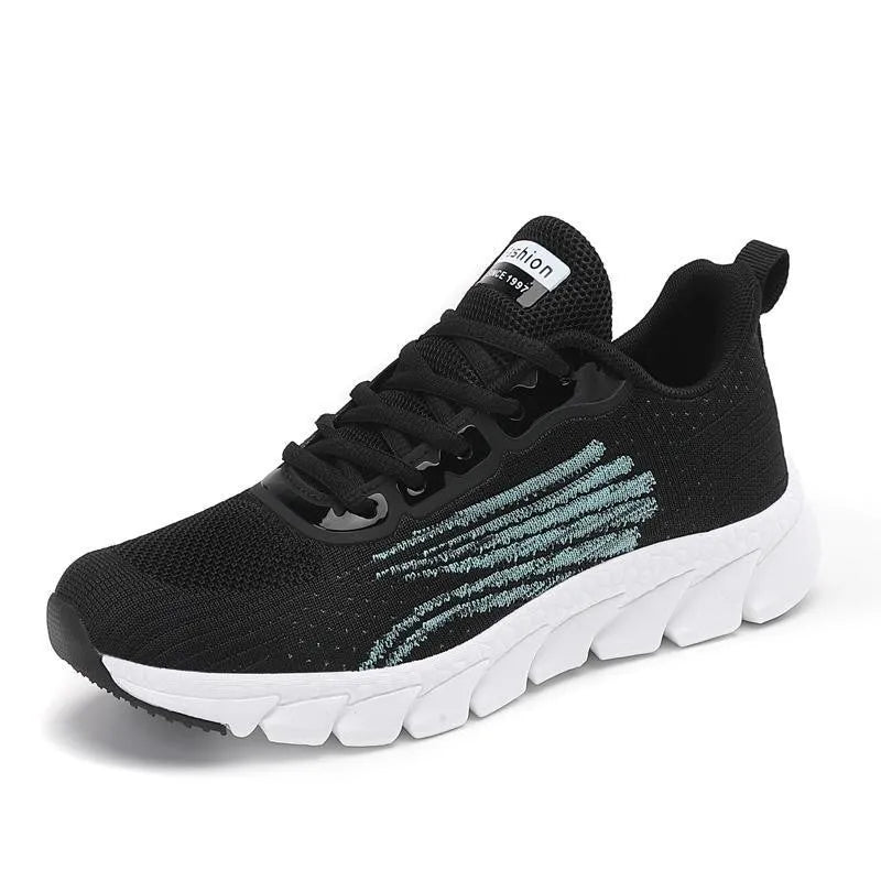 Women's black and white low-top casual running sneakers with round toe and MD soles