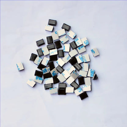 Black PA66 nylon car wire retaining clip for managing automotive and LED electronic cables.