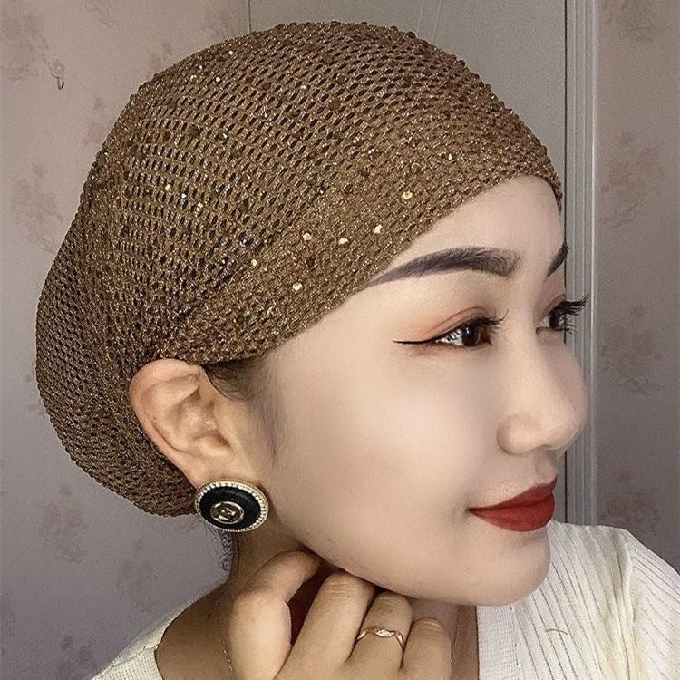 Stylish knitted beanie cap with hollow-out pattern in various colors, perfect for keeping warm and fashionable in the UK