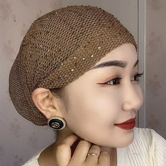 Stylish knitted beanie cap with hollow-out pattern in various colors, perfect for keeping warm and fashionable in the UK