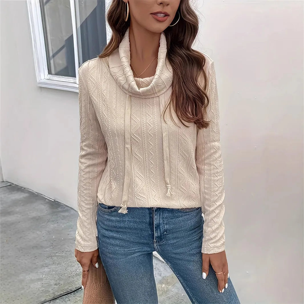 Apricot coloured women's hooded pullover sweater with drawstring and long sleeves