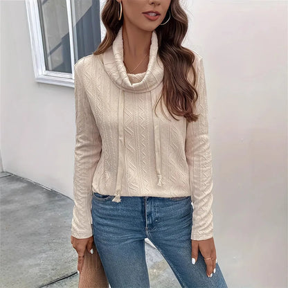 Apricot coloured women's hooded pullover sweater with drawstring and long sleeves