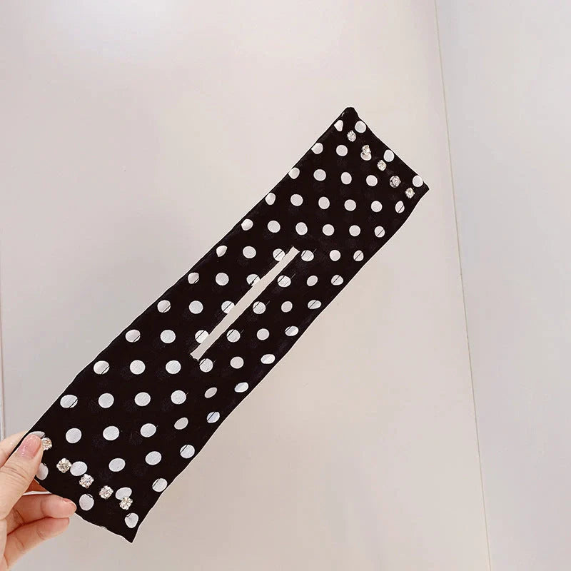 Women's elegant cloth headband with diamond or pearl accents for stylish hairstyles