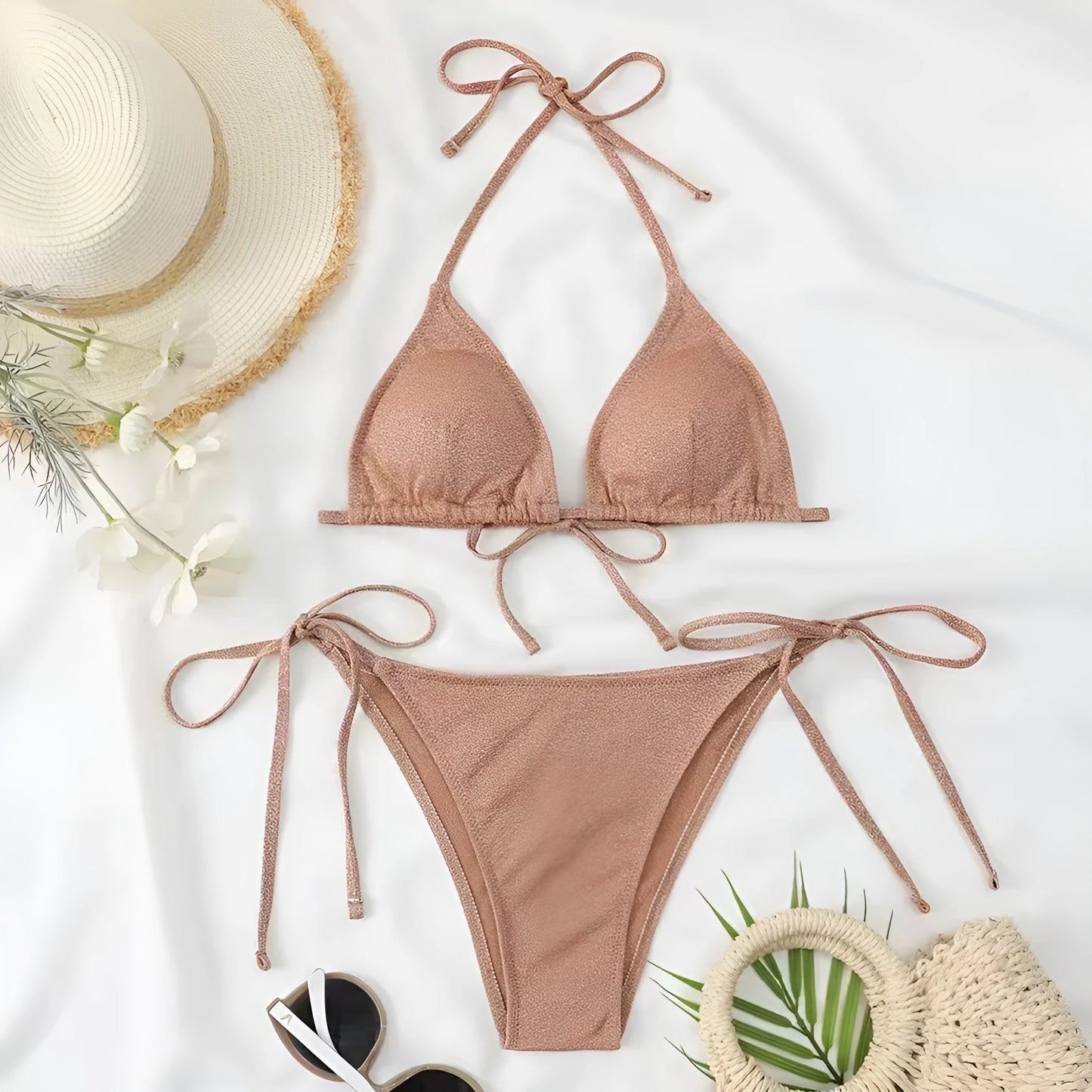 Women's khaki gold bandage bikini with adjustable straps on a beach background