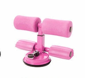 Compact sit-up strength trainer with steel springs and foam padding for home fitness