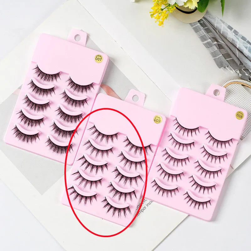 Three styles of black anime false eyelashes on a white background from a 15-pair pack.