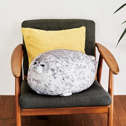 A plush, lifelike seal cushion in various sizes and colours, made of soft velvet fabric and PP cotton filling
