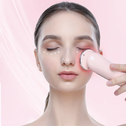 Pink and white facial massager with light therapy and pore cleansing features