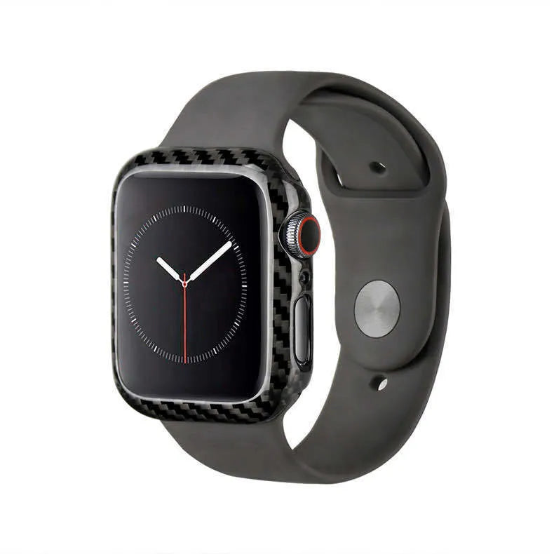 Apple Watch Series 4 in a black carbon fibre case with a leather half-wrap on a wrist