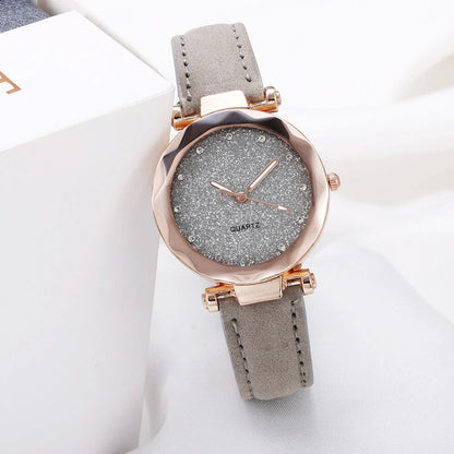 Elegant women's wrist watch with a captivating starry sky dial and leather strap, suitable for any occasion.
