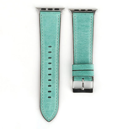 Leather watch strap with a folding buckle in blue, shown next to brown, green, orange, pink, and yellow colour options.