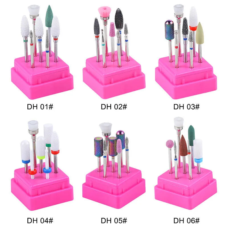 Set of six tungsten steel nail drill bits and a brush in a clear plastic case.